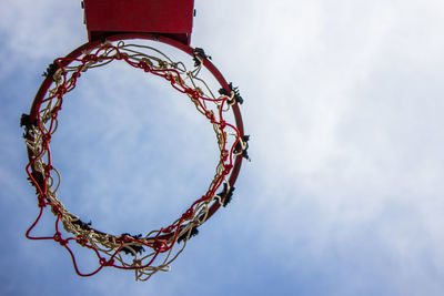 Low angle view of basketball hoop against sky