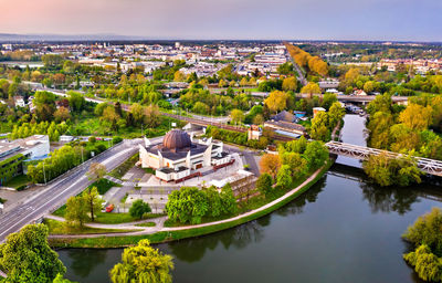 High angle view of river amidst buildings in city