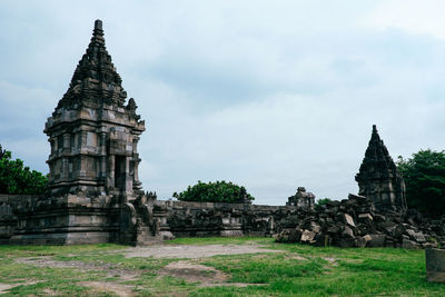 View of temple against building