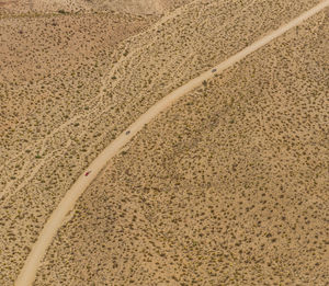 High angle view of vehicles on country road