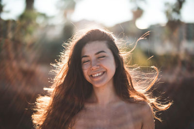 Smiling beautiful woman with brown hair