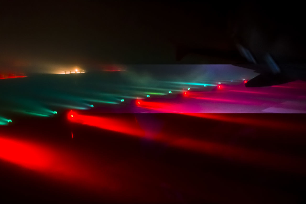 BLURRED MOTION OF ILLUMINATED RED LIGHTS