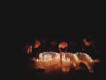 Group of people in the dark