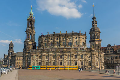 View of buildings in city against sky