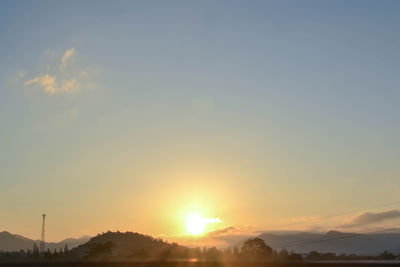Scenic view of mountains against sky during sunset