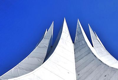 Low angle view of building against blue sky