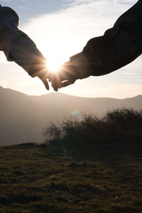 Hand in hand sunset 