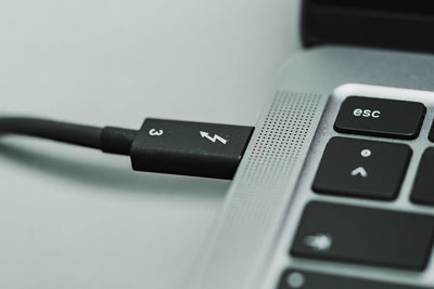 Close-up of computer keyboard against white background