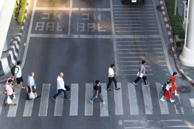 Group of people crossing road