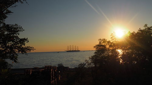 Scenic view of sea against sky at sunset