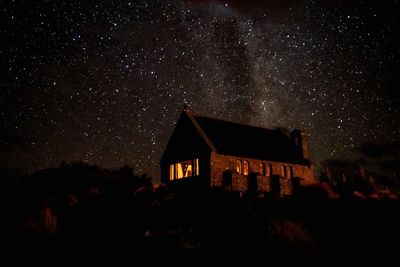 Low angle view of building against sky at night