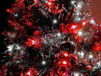 Illuminated christmas tree at night
