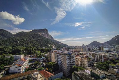 High angle view of buildings in city against sky