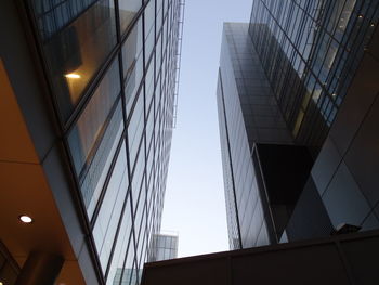 Low angle view of modern buildings against clear sky