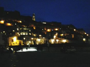 Illuminated street light at night