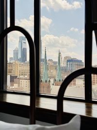 Buildings seen through window