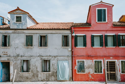 Low angle view of residential building against sky