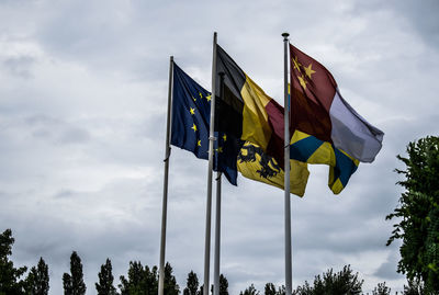 Low angle view of flag against sky