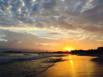 Scenic view of sea against dramatic sky