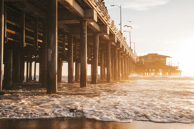 Santa monica pier on beach and pacific ocean