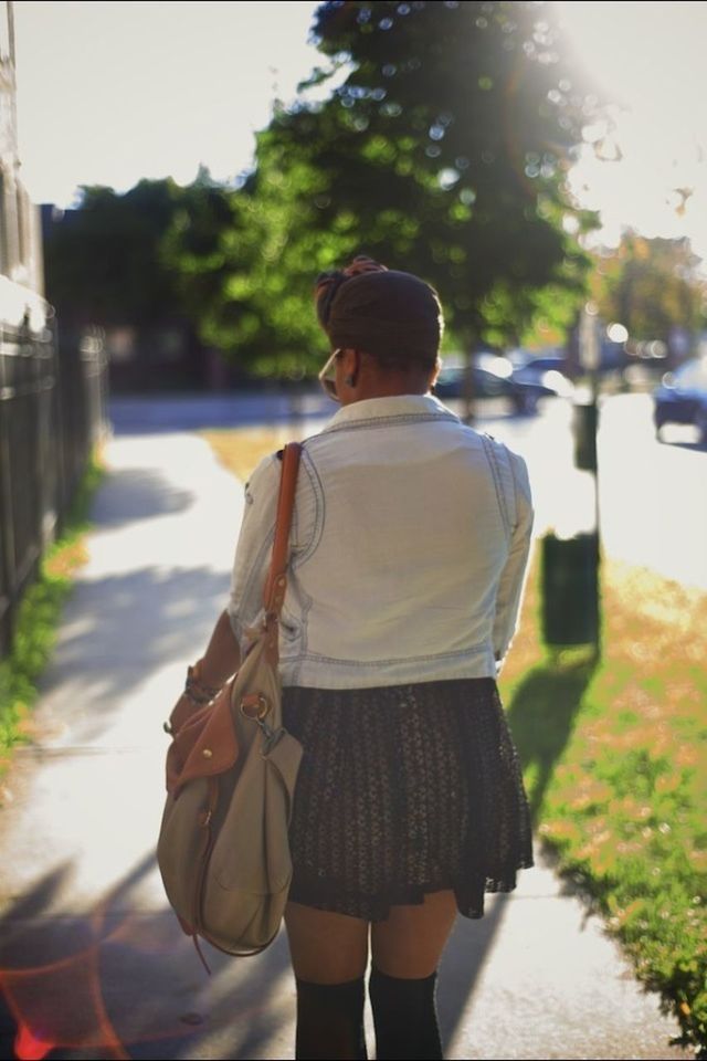 lifestyles, focus on foreground, rear view, street, casual clothing, leisure activity, road, transportation, tree, full length, standing, walking, car, mode of transport, day, outdoors, holding, sidewalk