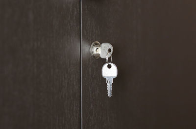 Close-up of keys on wardrobe