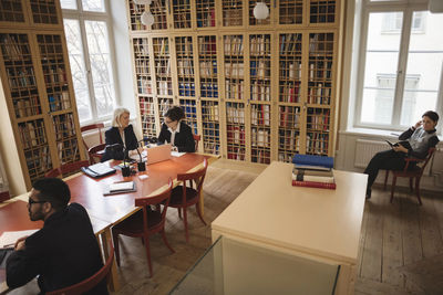 Group of people on book