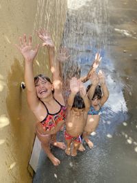 High angle view of woman swimming in water