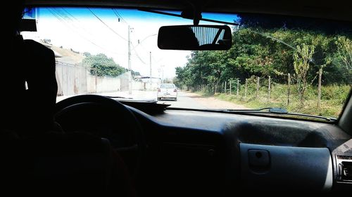 Road passing through car windshield