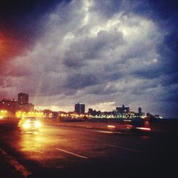 View of city against cloudy sky