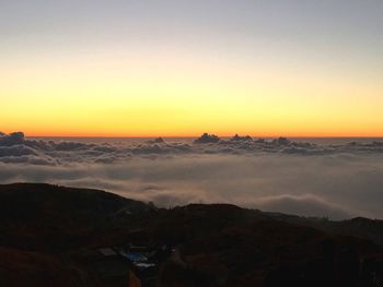 Scenic view of landscape against sky during sunset