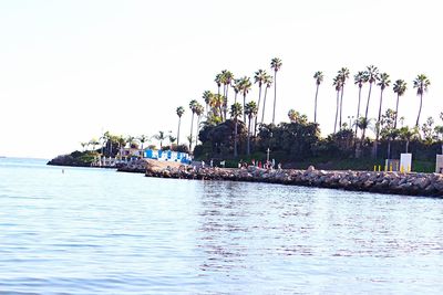 View of sea with buildings in background