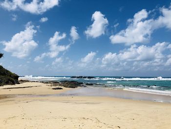 Scenic view of beach against sky