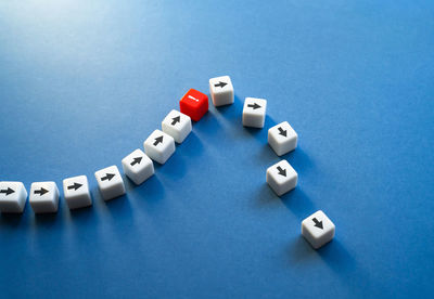 Close-up of dices on blue background