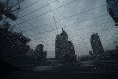 Close-up of wet window in rainy season