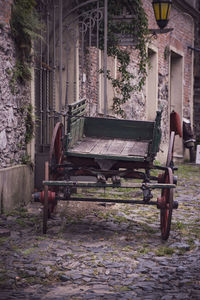 Empty bench in abandoned building