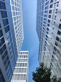 Low angle view of modern buildings in city