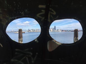 City seen through window