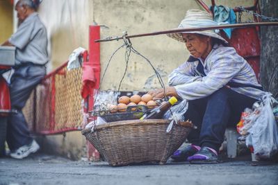 Women selling eggs on street