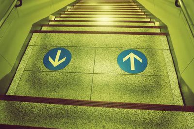 High angle view of information sign on floor