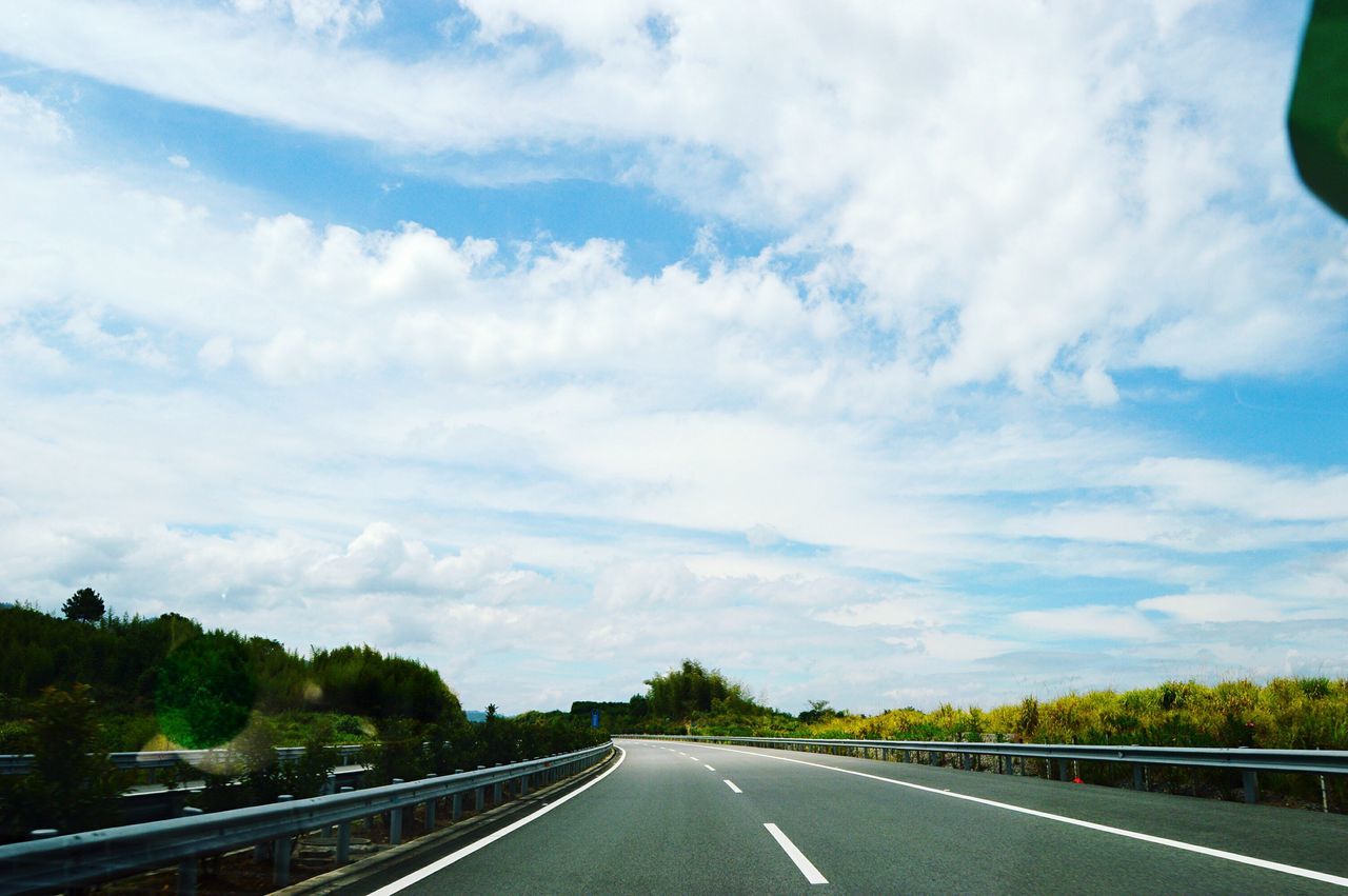 transportation, the way forward, road, road marking, sky, cloud - sky, tree, diminishing perspective, vanishing point, long, day, cloudy, plant, tranquil scene, nature, tranquility, outdoors, countryside, blue, non-urban scene, country road, dividing line, solitude, scenics, cumulus cloud, remote, surface level, straight, white line, beauty in nature