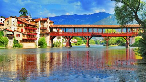 View of river with houses in background