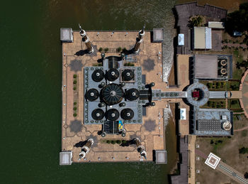 Aerial view of buildings against sea