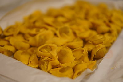 High angle view of yellow slices in plate