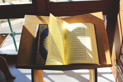 High angle view of open book on table