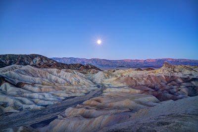 Scenic view of mountains against clear sky