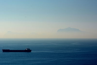 Cargo ship on mediterranean sea. ischia. campania. italy