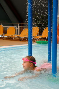 Man swimming in pool