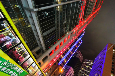 Low angle view of illuminated building at night