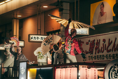 People standing on display at home